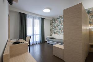 Posteľ alebo postele v izbe v ubytovaní Alaba Hotel + 37 fotografií
