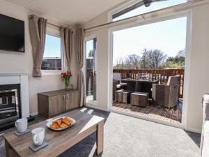 Istumisnurk majutusasutuses Honeysuckle Lodge