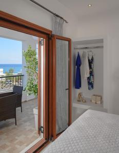 Postel nebo postele na pokoji v ubytování Auster House Santorini