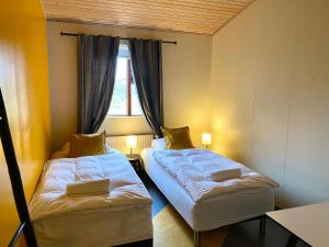 Paradise Cave Hostel & Guesthouse客房内的一张或多张床位