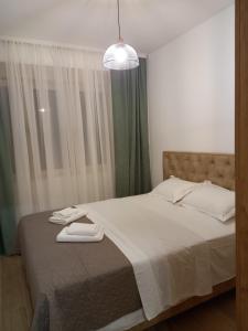 Voodi või voodid majutusasutuse Solaris Apartments toas
