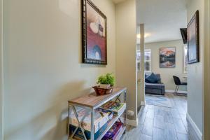 a hallway of a home with a shelf with books at Cozy 1 bedroom Apartment Canmore / Banff in Canmore