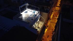 an overhead view of a boat at night at The Sorabellas in Gaeta