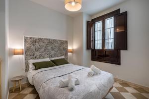 Posteľ alebo postele v izbe v ubytovaní ADANAR-Las Columnas