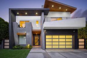 a modern house with yellow garage doors at Alfred Villa in Los Angeles