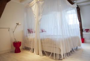 Postel nebo postele na pokoji v ubytování Bed en Brood - Veere