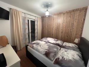 Postel nebo postele na pokoji v ubytování Appartment in Kammerl