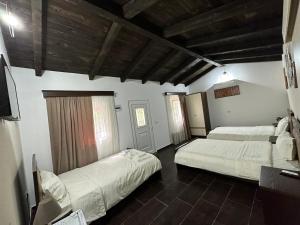 Postel nebo postele na pokoji v ubytování Ara E Vjeter Resort