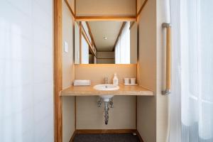 Koupelna v ubytování Ryokan Ryokufuso