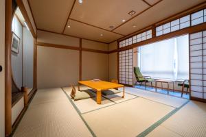 Posezení v ubytování Ryokan Ryokufuso