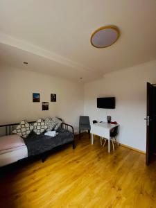 Posteľ alebo postele v izbe v ubytovaní Cristal Apartament Krynica - Zdrój