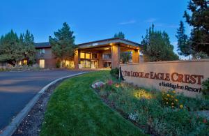 a sign in front of a large building at The Lodge at Eagle Crest in Redmond