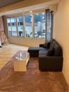 Posezení v ubytování Cloud Sharing Hotel Hakata 1 Guesthouse Dormitory