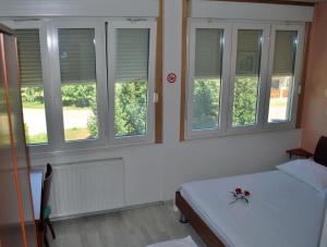Postel nebo postele na pokoji v ubytování Bed and Breakfast Kogoj