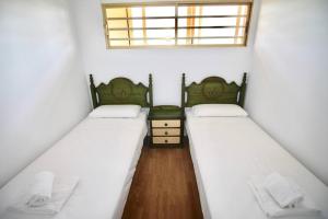Postel nebo postele na pokoji v ubytování Apartamento con gran urbanización y piscina