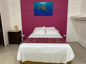 Postel nebo postele na pokoji v ubytování Villa Tortugas