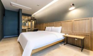 Voodi või voodid majutusasutuse Anseong Nomad Hotel toas