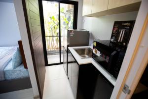 A kitchen or kitchenette at VIP Great Hill