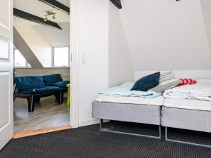 Ένα ή περισσότερα κρεβάτια σε δωμάτιο στο 17 person holiday home in Harboøre-By Traum