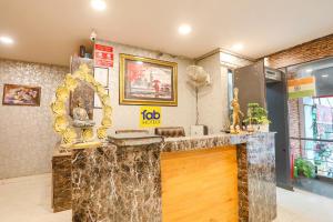 a kitchen with a marble counter top in a room at FabHotel Royal Galaxy I in New Delhi