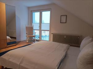 Postel nebo postele na pokoji v ubytování Ferienwohnung Koch