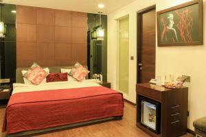 Voodi või voodid majutusasutuse The Nanee Suites toas