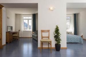 Postel nebo postele na pokoji v ubytování Grand Hotel Molveno + 37 fotografií