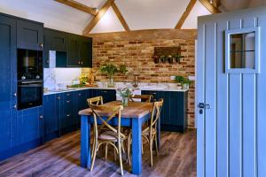 Køkken eller tekøkken på The Shooting Lodge