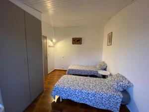 Posteľ alebo postele v izbe v ubytovaní T3 avec terrasse au cœur de Portovecchio