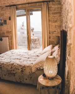 Säng eller sängar i ett rum på Barocco House