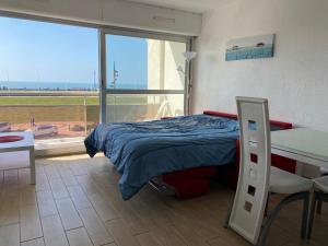 Krevet ili kreveti u jedinici u okviru objekta Superbe Appartement Superbe Vue Océan