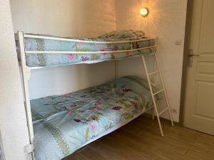 Krevet ili kreveti u jedinici u okviru objekta Superbe Appartement Superbe Vue Océan