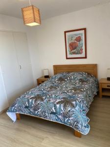 Krevet ili kreveti u jedinici u okviru objekta Superbe Appartement Superbe Vue Océan