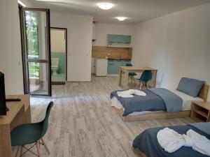 A bed or beds in a room at Apartment's Pita & Mare