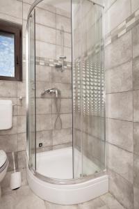 Ένα μπάνιο στο Holiday House Fontanele