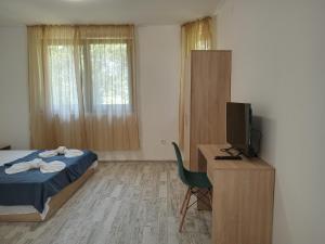 A bed or beds in a room at Apartment's Pita & Mare