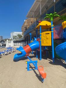 a playground on the beach with a play equipment at Orange County Alanya Family Only in Alanya