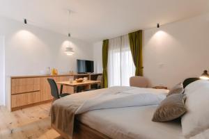 Postel nebo postele na pokoji v ubytování PIRA HOTEL