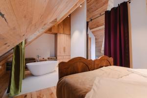 Postel nebo postele na pokoji v ubytování PIRA HOTEL