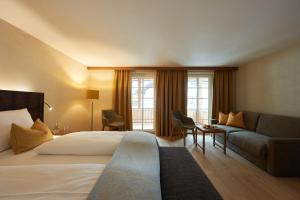 Letto o letti in una camera di Après Post Hotel