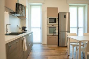 Kép 15min metro Duomo - RHO fiera - Skyscraper Kitchen szállásáról Milánóban a galériában Még 24 kép