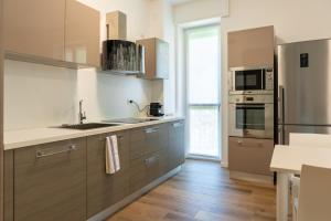 Kép 15min metro Duomo - RHO fiera - Skyscraper Kitchen szállásáról Milánóban a galériában