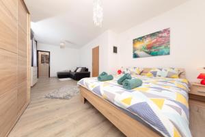 Ένα ή περισσότερα κρεβάτια σε δωμάτιο στο Holiday House Fontanele +103 φωτογραφίες