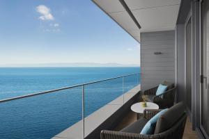 a balcony with a view of the ocean at JW Marriott Hotel Istanbul Marmara Sea in Istanbul