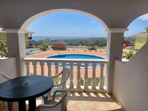 The swimming pool at or close to Apartamento vacacional Urb. Nerea II REF. 065