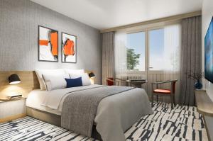 a bedroom with a large bed and a large window at Erzurumlu Hotel in Kilyos