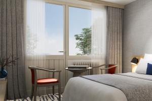 a hotel room with a bed and a window at Erzurumlu Hotel in Kilyos