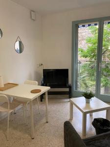 TV a/nebo společenská místnost v ubytování La MAISON D'ANTONIN