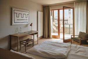 Postel nebo postele na pokoji v ubytování Hotel Schwarzschmied + 37 fotografií