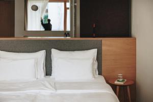Postel nebo postele na pokoji v ubytování Hotel Schwarzschmied